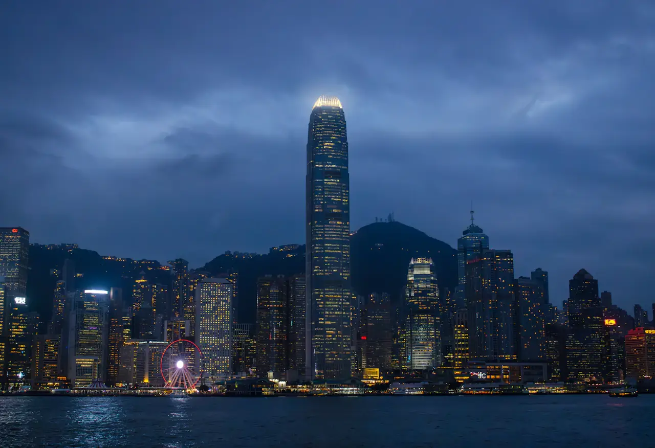 Victoria Harbour and the Hong Kong Island skyline at dusk