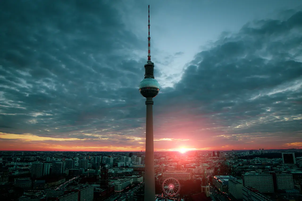 The Berlin TV Tower against a sunset sky