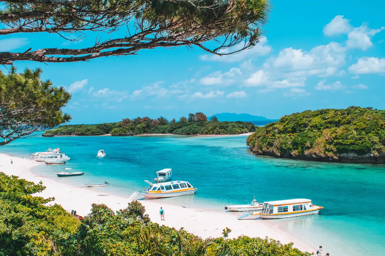 Boats on the turquoise water of Kabira Bay, Ishigaki Island