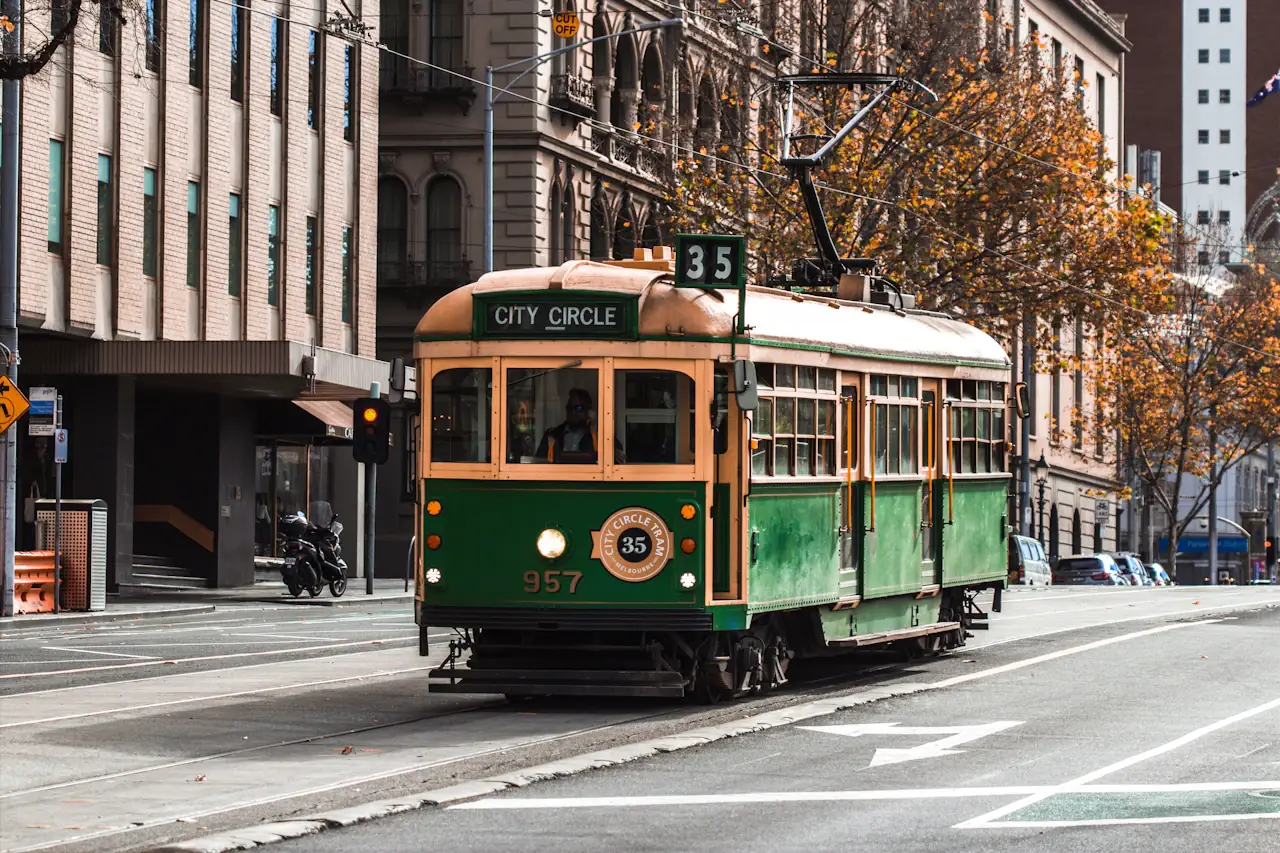 A classic green City Circle tram on a Melbourne street