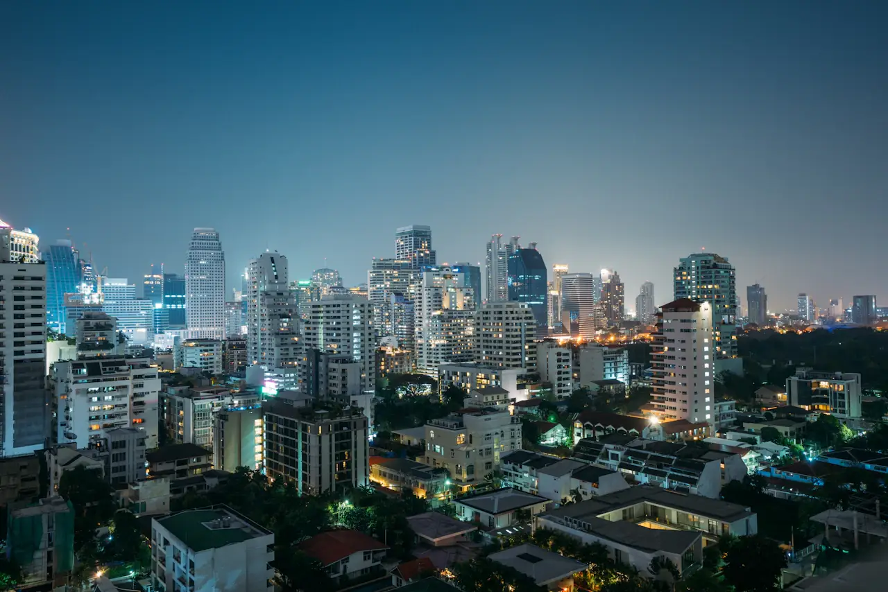 Bangkok's skyline of towers seen from above at dusk